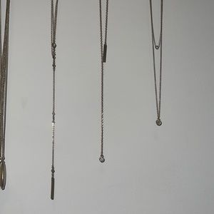 4 delicate gold necklaces